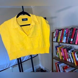 A crop top barely warn.